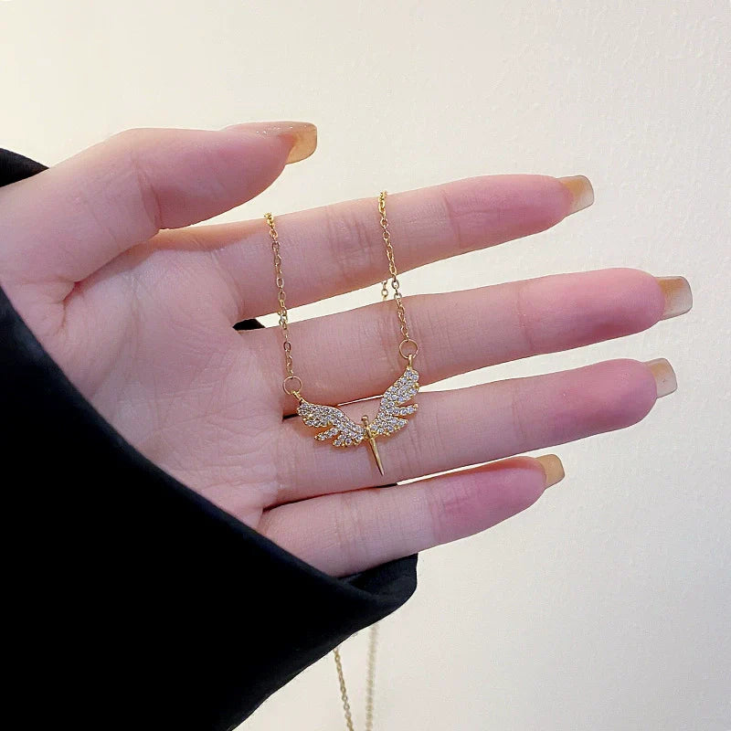 Wholesale Real Gold Plated Full Diamond Geometric Wings Sword Pendant Titanium Steel and Copper Necklace for Women